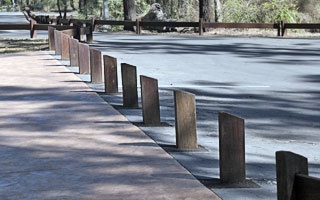 Timber traffic barrier, bollards from Outdoor Structures Australia