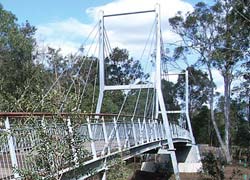 72 meter span Steel/Timber pedestrian bridge by Outdoor Structures Australia